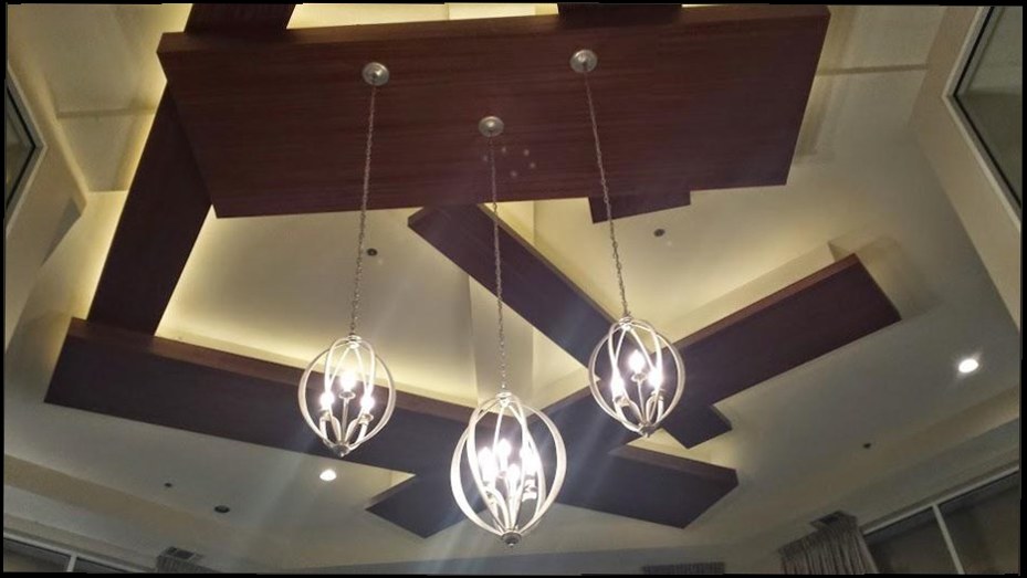 Harrison & Sons Electrical — three pendant-orb chandeliers installed on a wood coffered ceiling